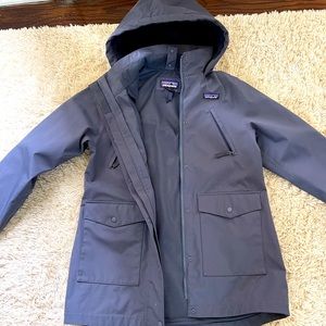 Patagonia girls hooded insulated rain jacket.